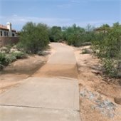 sidewalk cleared of silt