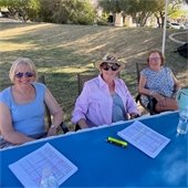 committee members at a check in table