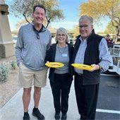 committee members holding plates at a breafkast