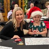 mother and daughter at santa party