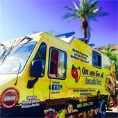 queso good food truck by a palm tree