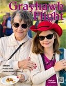 woman and girl standing close