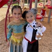 two girls in costumes