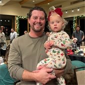 dad and daughter at santa party